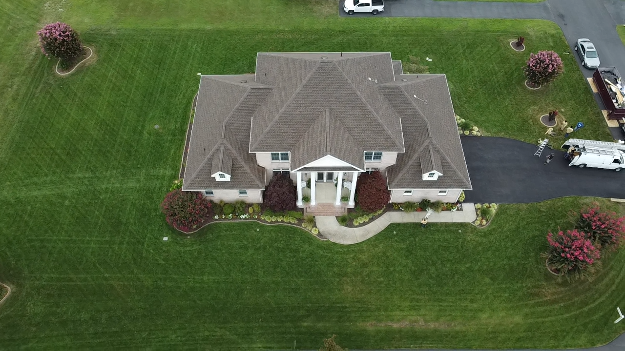 Aerial view of a grey shingle roof