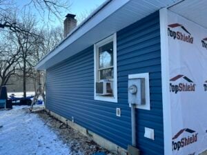 types of siding Grand Exteriors blue wood project