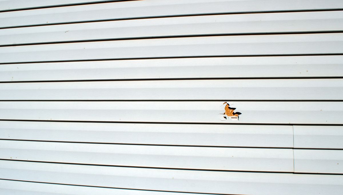 siding seaford hole in vinyl
