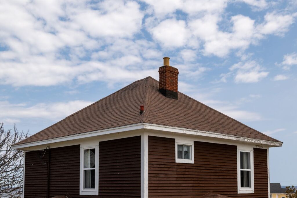 roof types orange chimney white windows
