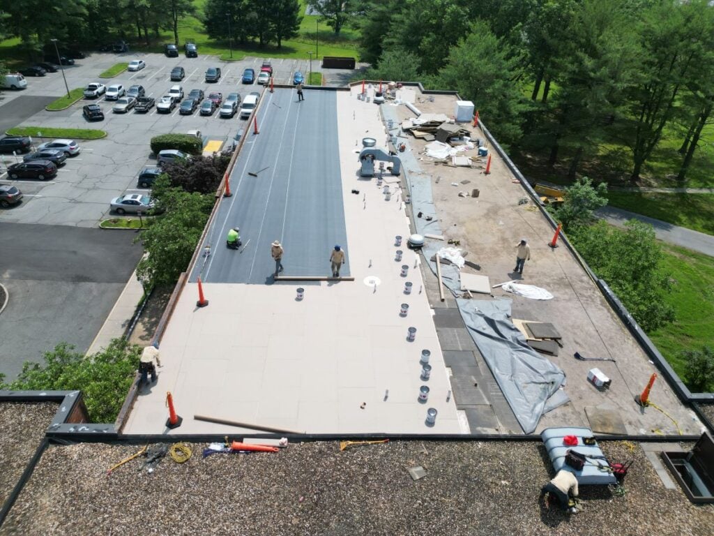 how to choose a good commercial roofing contractor Grand Exteriors