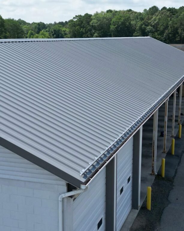 roof types grey metallic roof commercial building Grand Exteriors project