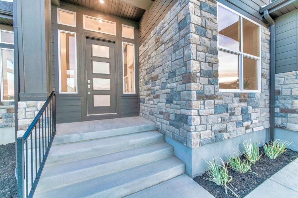 types of siding stone veneer house