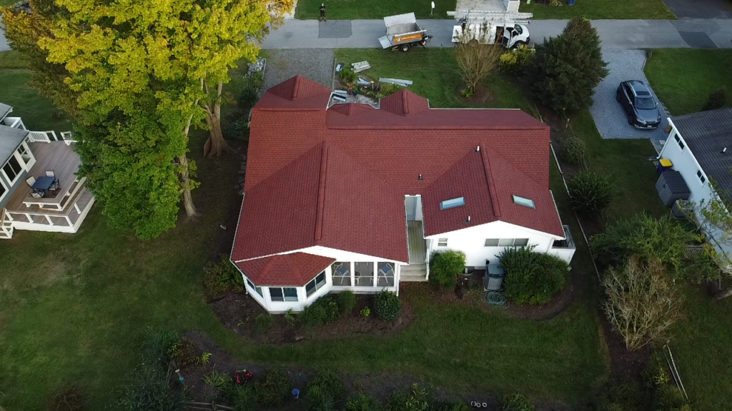 house and roof color combinations brown shingles roof and white wall aerial view