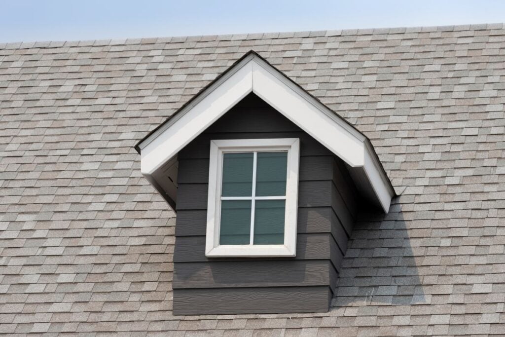 architectural shingles vs 3 tab light grey roof white frame window
