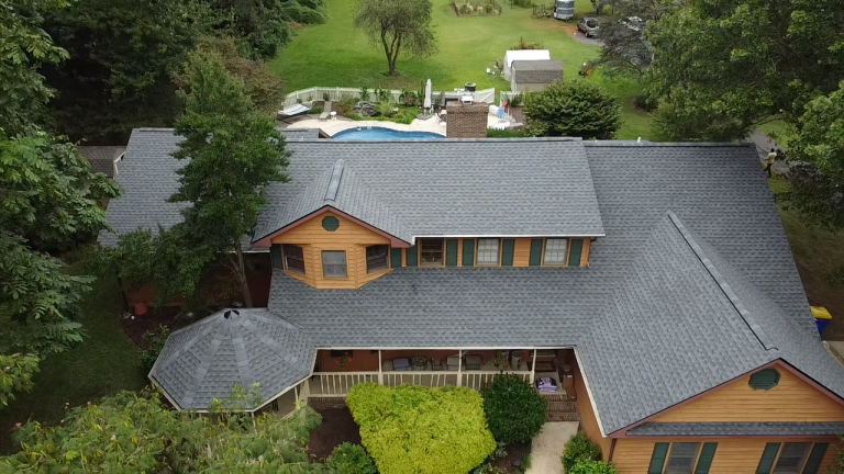Aerial view of a light grey roof, roof maintenance