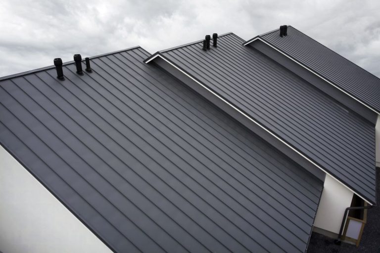 Close-up house retro roof panel with standing seam